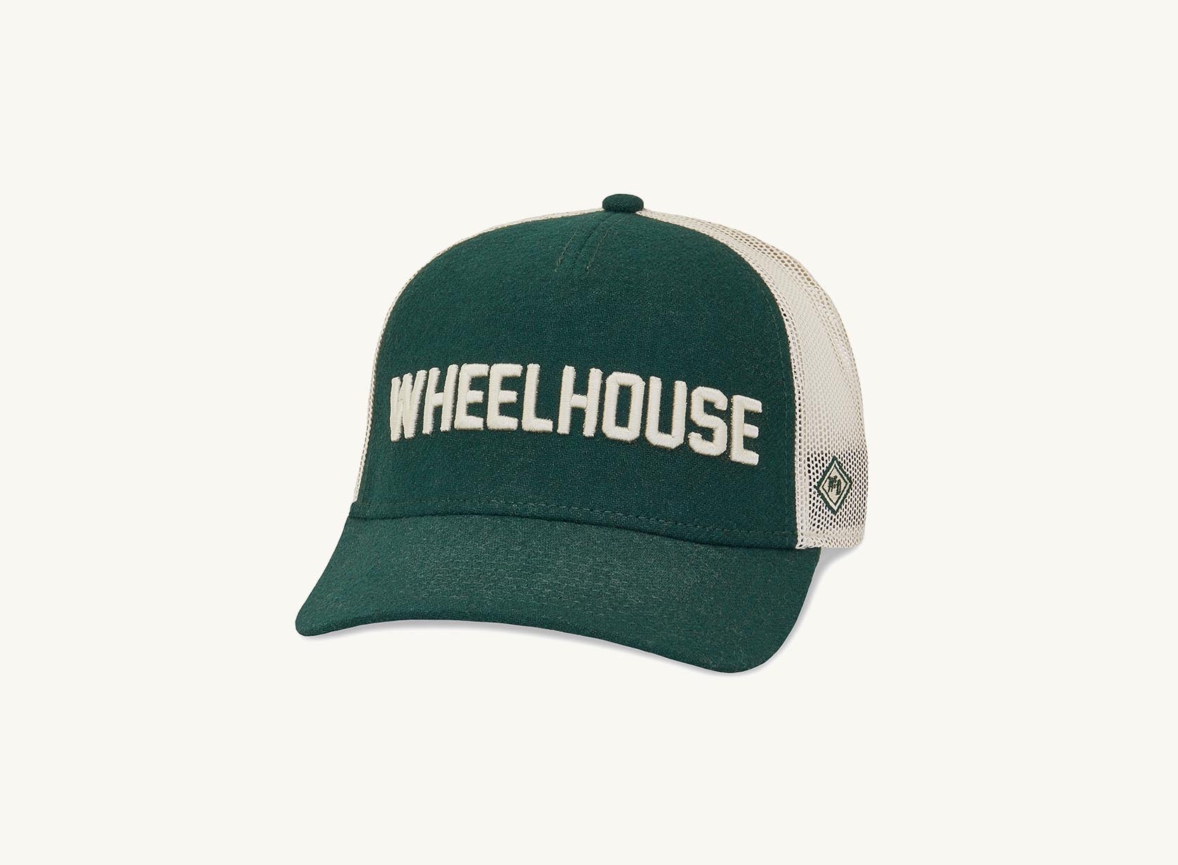 green and beige wheel house hat