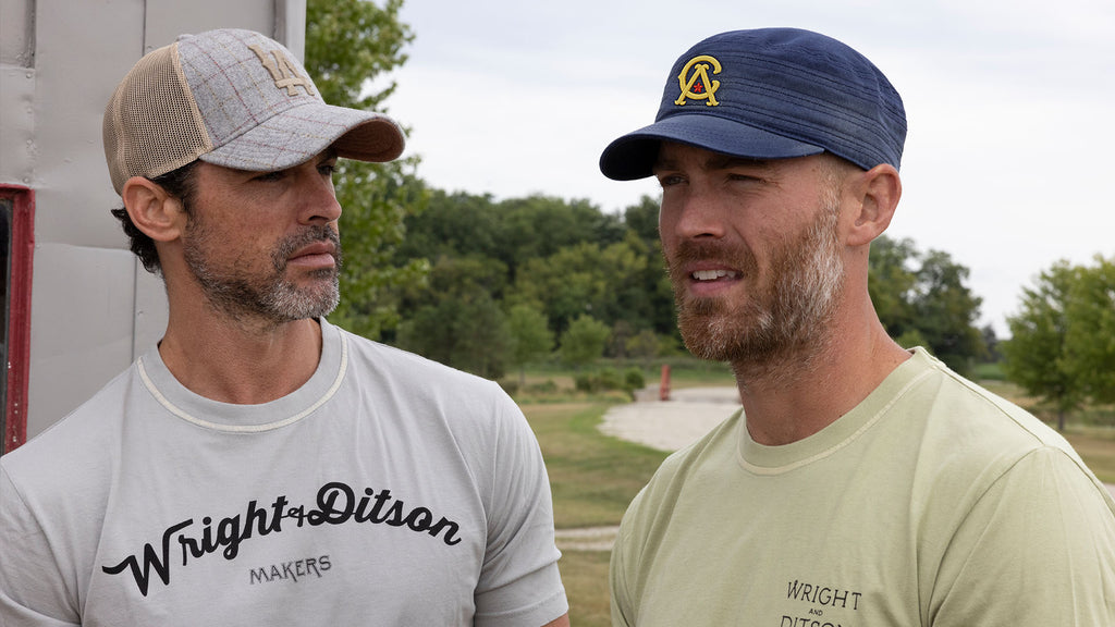 two men wearing Wright & Ditson branded apparel 