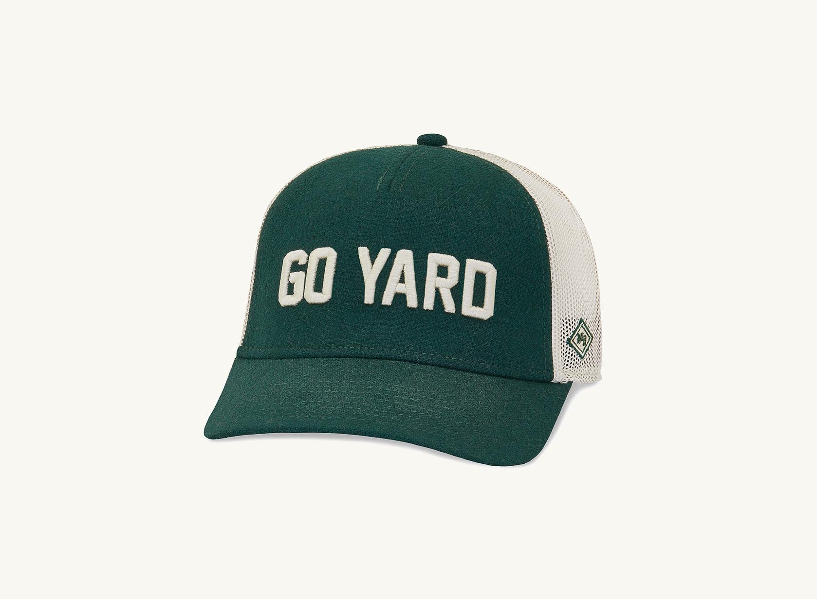 green and beige go yard hat